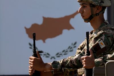 A Cypriot soldier takes part in a military parade in Nicosia marking the 62nd anniversary of Cyprus's independence from British colonial rule.  AP