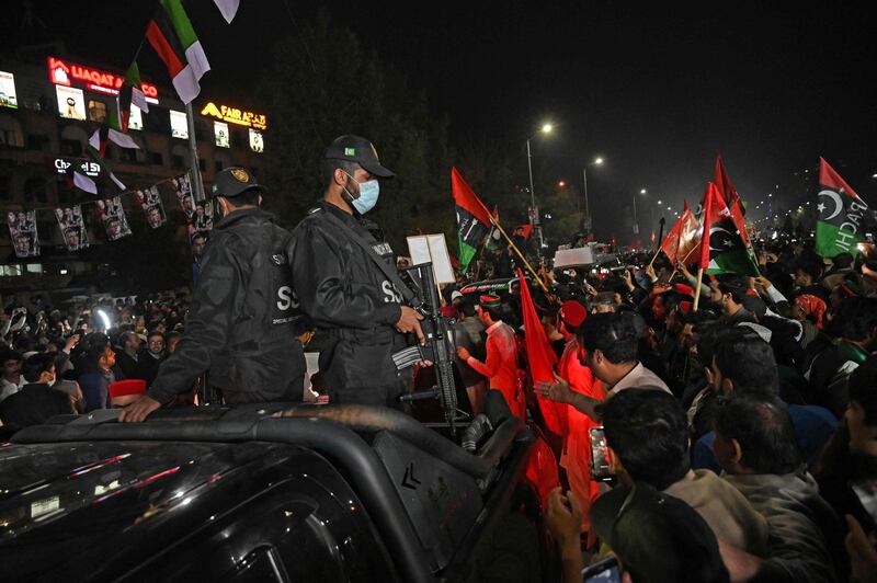 Security forces at the rally. It follows a formal no-confidence motion against Mr Khan that was submitted to Parliament by the opposition, led by the PPP. AFP