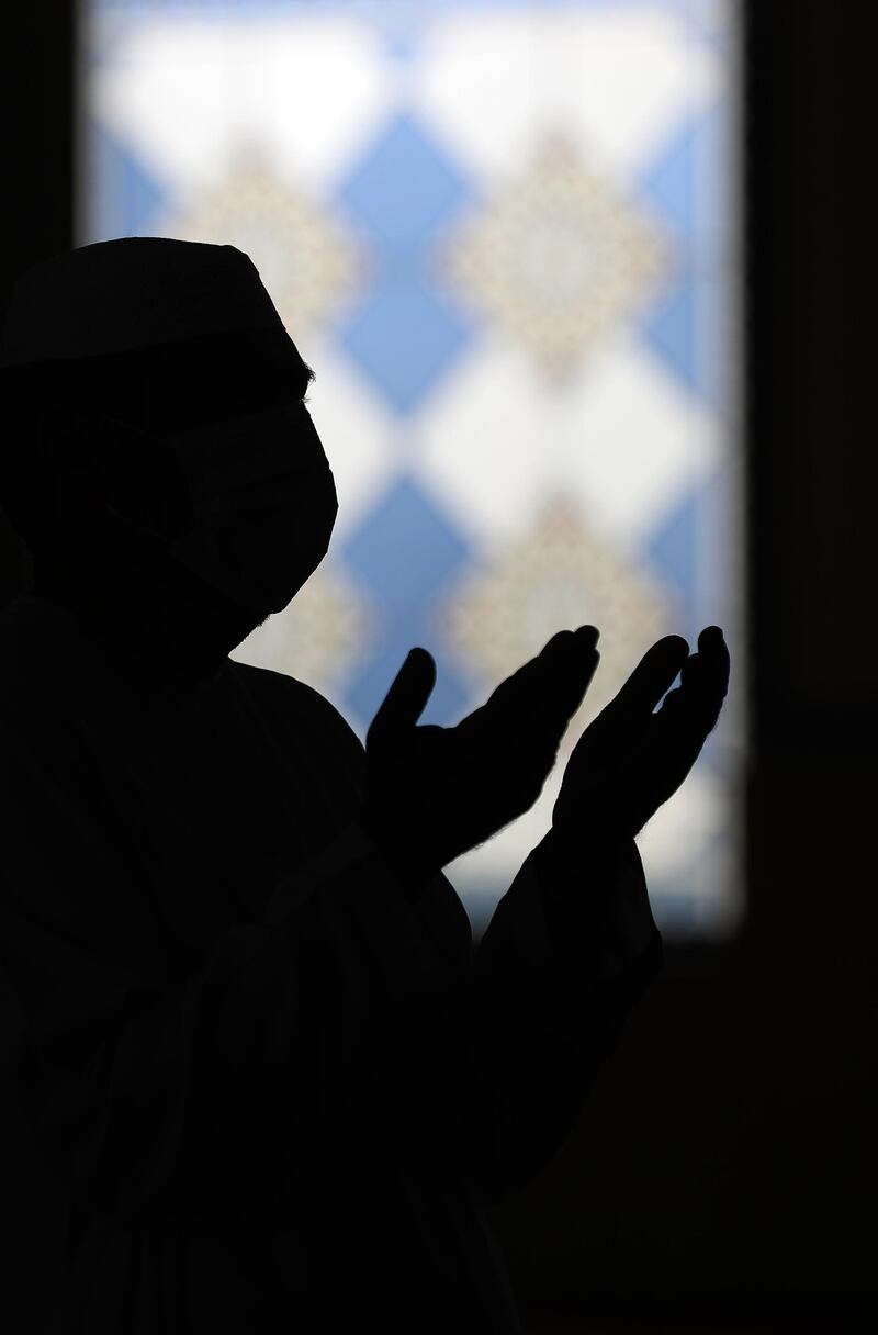 Dubai, United Arab Emirates - December 03, 2020: A man prays at Al Farooq Omar Bin Al Khattab Mosque. Thursday, December 3rd, 2020 in Dubai. Chris Whiteoak / The National