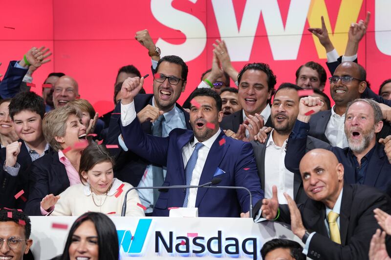 Swvl chief executive Mostafa Kandil and chief financial officer Youssef Salem celebrate as Swvl makes its Nasdaq debut on Thursday. Photo: Swvl