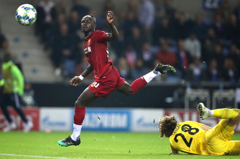 Sadio Mane on his way to scoring Liverpool's third goal. AP Photo