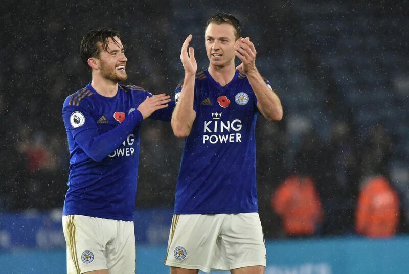 Leicester City players Ben Chilwell and Jonny Evans celebrate at full-time following the win over Arsenal. AP Photo