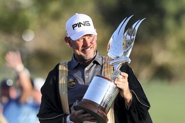 Lee Westwood won the Abu Dhabi HSBC Championship at the start of the 2020 season and clinched the Race to Dubai title to conclude the year. Chris Whiteoak / The National