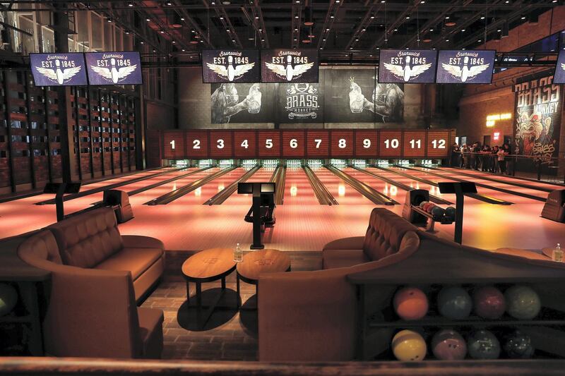 DUBAI, UNITED ARAB EMIRATES , September 27 – 2020 :- View of the 12 bowling lanes at the Brass Monkey, new dining and entertainment destination on the Bluewaters Island in Dubai.  (Pawan Singh / The National) For Lifestyle/Online/Instagram. Story by Janice Rodrigues 