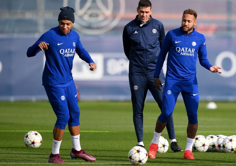 Kylian Mbappe and Neymar train for Tuesday's Champions League first round match against Benfica. AFP