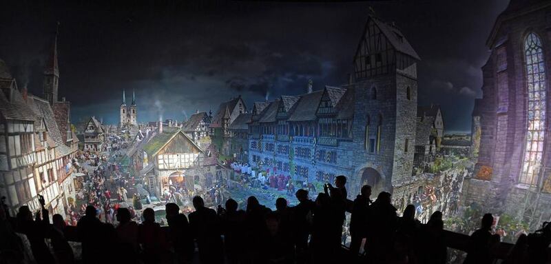 Visitors at a private viewing look at the artist Yadegar Asisi’s new 360-degree panorama painting depicting events from the reformation in Wittenberg, Germany. A special building was constructed in Wittenberg, the town in which Luther supposedly posted his 95 theses on the door of the All Saints’ Church in 1517, to house the painting due its size. Hendrik Schmidt / EPA