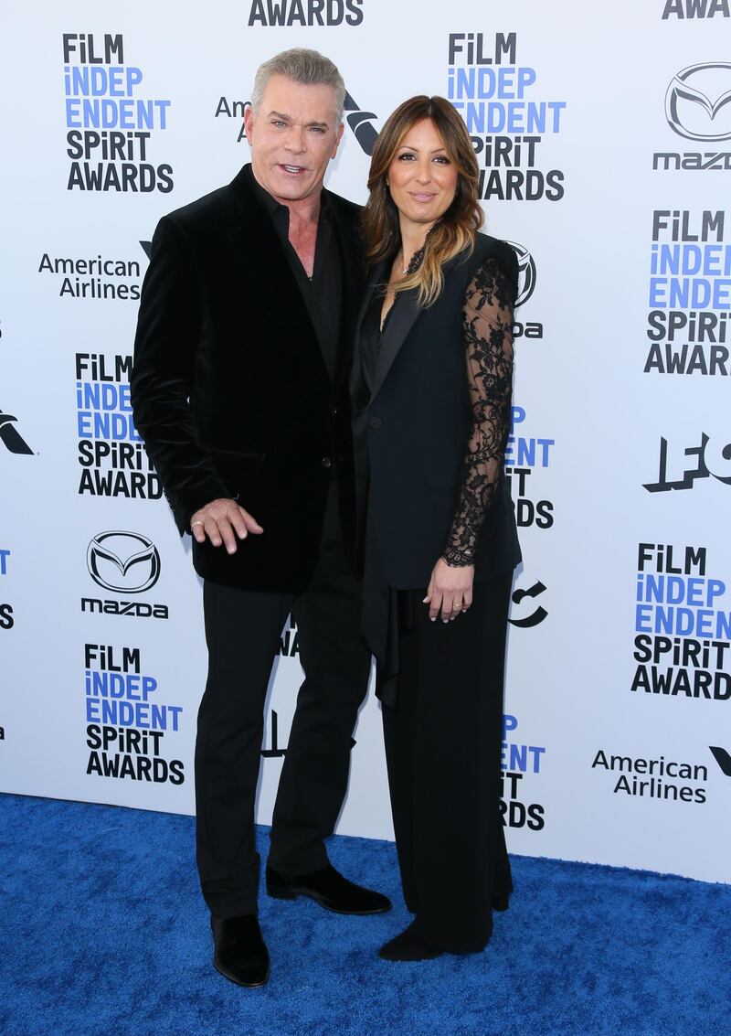 Ray Liotta and Jacy Nittolo arrive for the 35th Film Independent Spirit Awards in California on February 8, 2020. AFP
