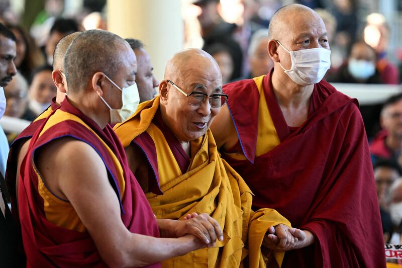 Dalai Lama, Tibetan spiritual leader, arrives to attend a long-life prayer offered to him by his devotees at a temple in McLeod Ganj, near Dharamsala, India. AFP