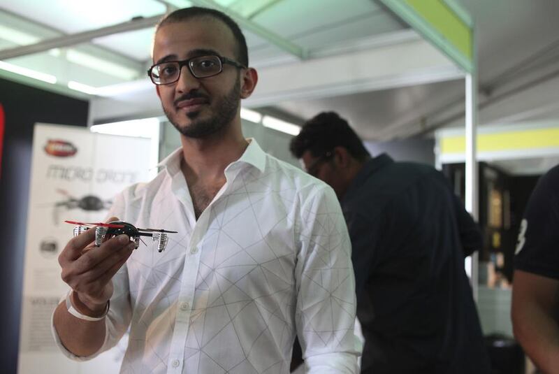 Fahed Abdullah, a Saudi Arabian visitor to the Big Boys Toys exhibition in Dubai, holds a Micro Drone 2.0. “There are interesting products here, but it’s as if there is no specific target audience,” he says. Lee Hoagland / The National