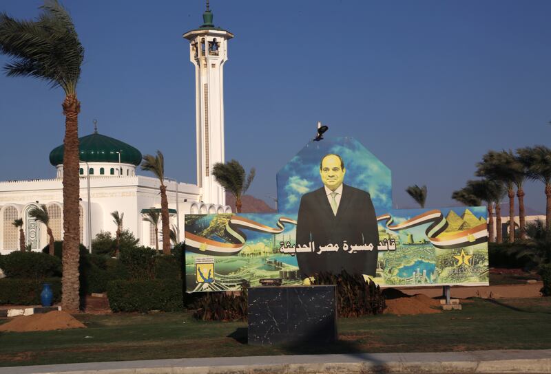 A billboard shows Egyptian President Abdel Fattah el-Sissi ahead of this year’s United Nations global summit on climate change, known as COP27, along Peace Road, in Sharm el-Sheikh, South Sinai, Egypt.  When world leaders, diplomats, campaigners and scientists descend on Sharm el-Sheikh in Egypt for talks on tackling climate change, don't expect them to part the Red Sea or perform other miracles that would make huge steps in curbing global warming. AP Photo