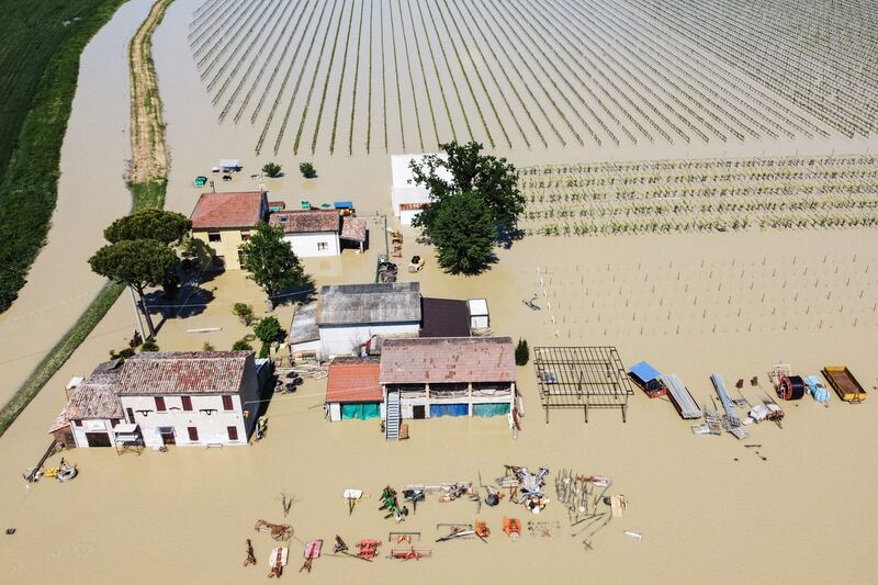 The flooded Italian village of Borgo di Villanova. At least two people died after 48 hours of almost continuous rain caused flooding in the north of the country, officials said. AFP