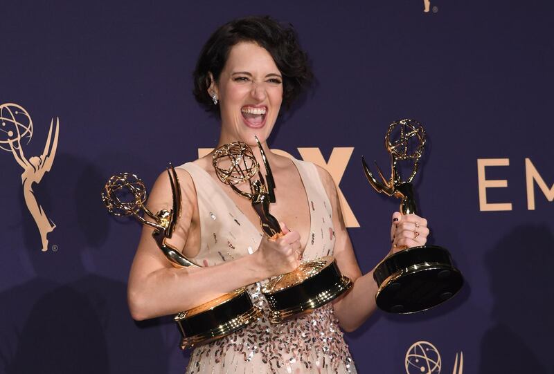 TOPSHOT - British actress Phoebe Waller-Bridge poses with the Emmy for Outstanding Writing for a Comedy Series, Outstanding Lead Actress In A Comedy Series and Outstanding Comedy Series for "Fleabag" during the 71st Emmy Awards at the Microsoft Theatre in Los Angeles on September 22, 2019. / AFP / Robyn Beck
