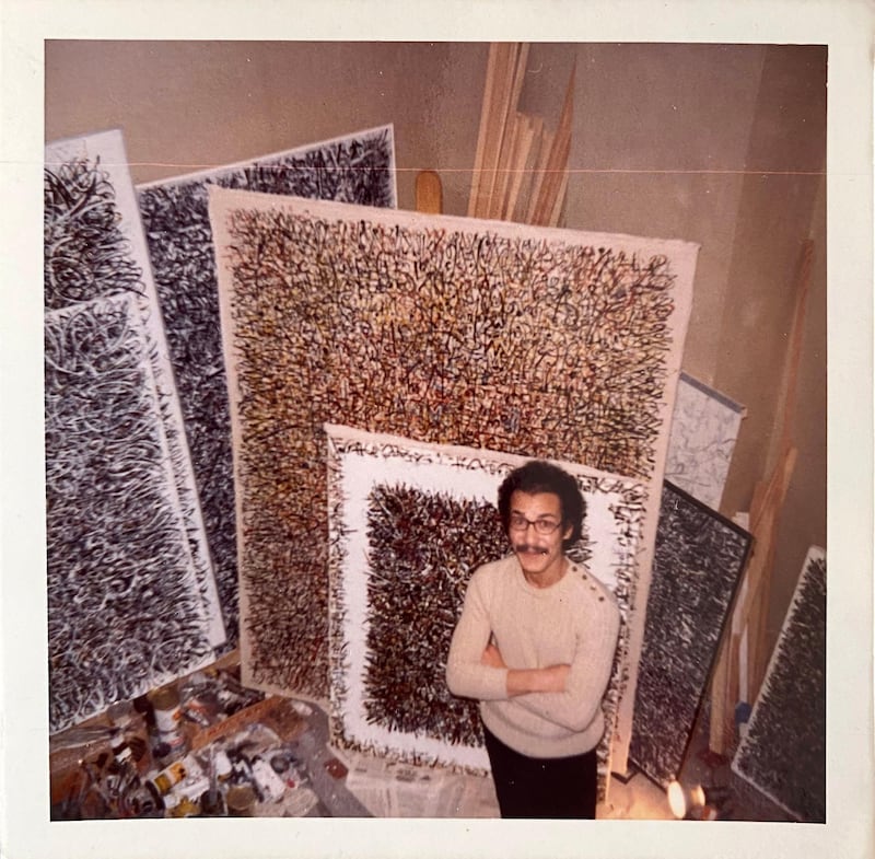 Mahjoub Ben Bella poses in front of his work in Paris in 1971. Nadjib Ben Bella
