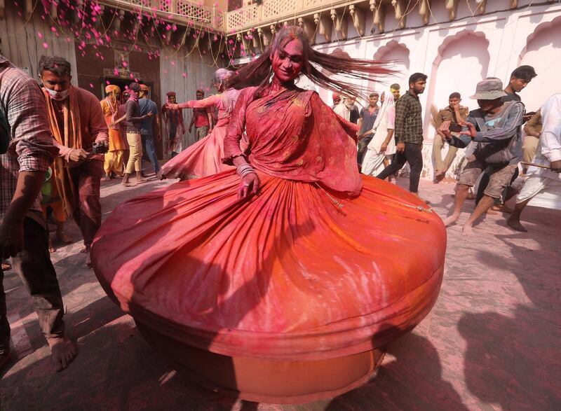 Indian devotees are covered with coloured powder during the Lathmar Holi festival at the Nandgram temple in Nandgaon, Mathura, India, 05 March 2020. EPA