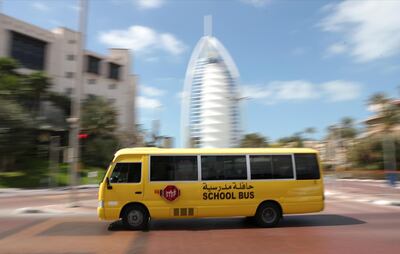 epa08271390 A school bus passes in front of Burj Al Arab Luxury Hotel in Dubai, United Arab Emirates, 04 March 2020 (issued on 05 March 2020). Dubai Health Authority (DHA) confirmed the diagnose of a school girl with coronavirus after it transferred from her father. The Ministry of Education of UAE has announced on 03 March 2020 the start of the initiative of learning from distance, also announced that on 08 March 2020 the private and public schools will start the four weeks spring vacation in addition to colleges and universities in UAE which was supposed to start on 29 March till 12 April, as a step to avoid the prevent the spread of the virus.  EPA/ALI HAIDER