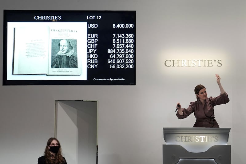 A Christie's auctioneer drops the gavel on the rare first folio. Reuters