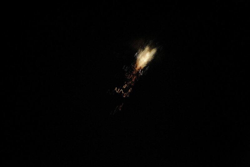 An exploded missile is seen over Damascus, Syria on May 10, 2018. SANA / Handout via Reuters