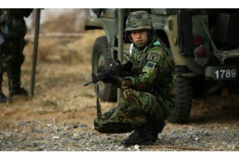A South Korean soldier takes part in a drill yesterday in Malipo, north-western South Korea.