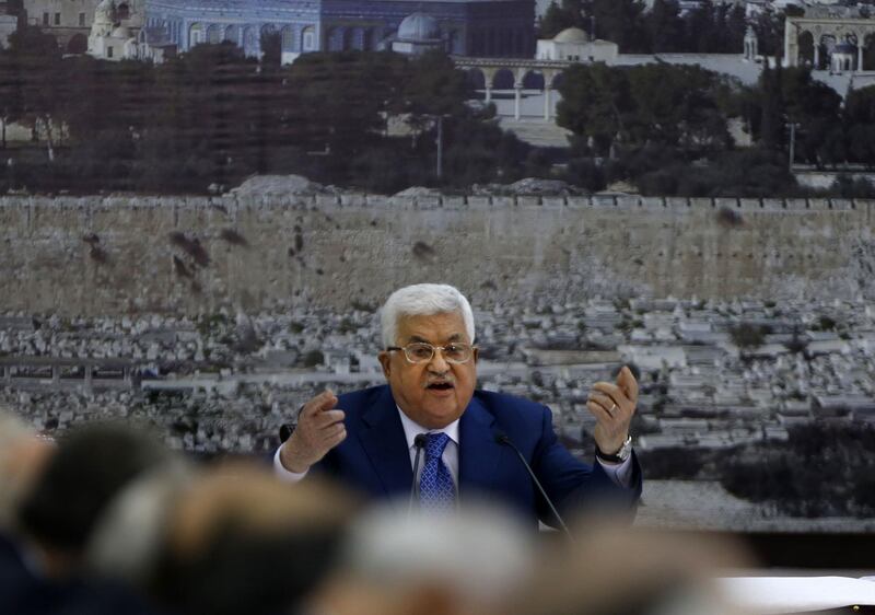 Palestinian Authority President Mahmud Abbas adresses the Palestinian leadership in the West Bank city of Ramallah on May 14, 2018.  Abbas condemned Israeli "massacres" along the Gaza Strip border after Israeli forces killed 52 Palestinians during clashes and protests coinciding with the opening of the US embassy in Jerusalem. Abbas, who declared three days of mourning, also said “the US is no longer a mediator in the Middle East," adding the new embassy is tantamount to “a new American settler outpost” in Jerusalem.
 / AFP / ABBAS MOMANI
