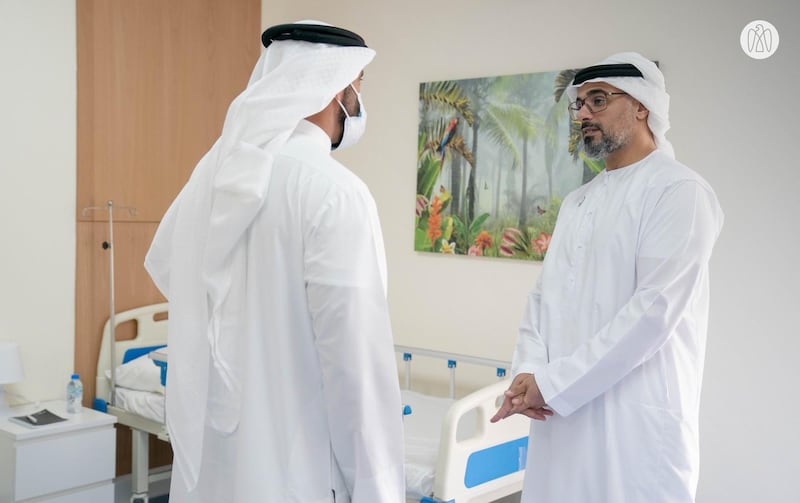 Sheikh Khalid bin Mohamed, right, visited one of the facilities built by Abu Dhabi Healthcare Services - or Seha - at Abu Dhabi National Exhibition Centre. Photo: Abu Dhabi Government Media Office