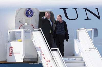 epa08605382 US State Secretary Mike Pompeo (L) and his wife Susan Pompeo (R) wave before boarding a plane at the Chopin Airport in Warsaw, Poland, 15 August 2020. US Secretary of State Mike Pompeo has come to Warsaw to meet with Poland's top officials, sign a new US-Poland defense deal and attend the commemoration of the centennial of the 1920 Battle of Warsaw, in which Polish forces defeated the Bolsheviks. POLAND OUT