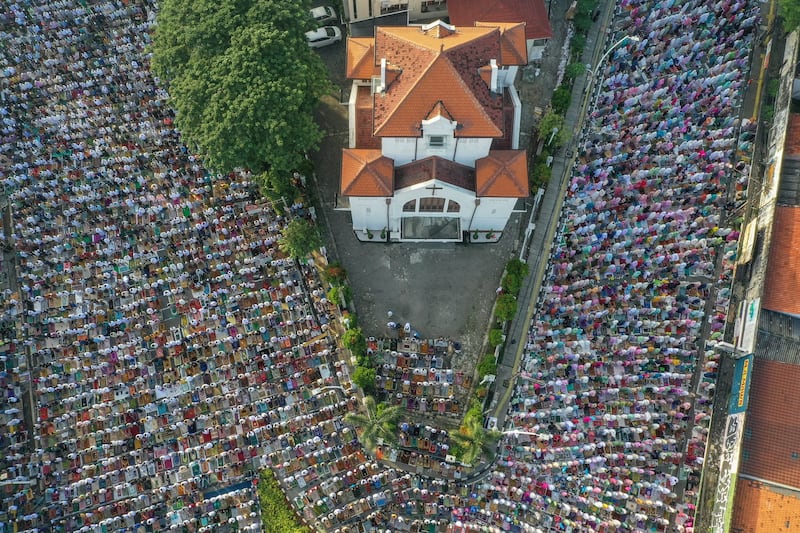 Crowds gather to pray on the first day of Eid in Jakarta. EPA
