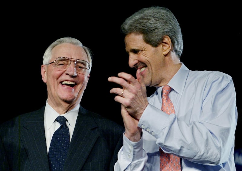 Mondale, left, shares a laugh with Democratic presidential candidate John Kerry during a campaign rally in St Paul, Minnesota in 2004. Reuters