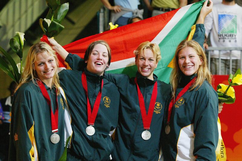 Charlene Wittstock, left, in South Africa's swimming team training kit, at the Commonwealth Games on August 4, 2002, in Manchester, England. Getty Images