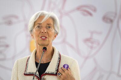 (FILES) In this file photo taken on June 14, 2019 International Monetary Fund (IMF) Managing Director Christine Lagarde shows a pin's she holds in solidarity whith a Swiss nation-wide women's strike for wage parity during her speech at the ILO International Labour Conference in Geneva. The European Union has not yet reached a consensus on a candidate to replace Christine Lagarde as head of the International Monetary Fund, the French finance ministry said on August 1, 2019. "At this stage, although some candidates' names gather more support than others, there is not yet a full consensus around one name," the French ministry, which had been spearheading efforts to find a candidate by the end of July, said. The post of IMF managing director goes to a European by convention while an American heads the World Bank. / AFP / FABRICE COFFRINI
