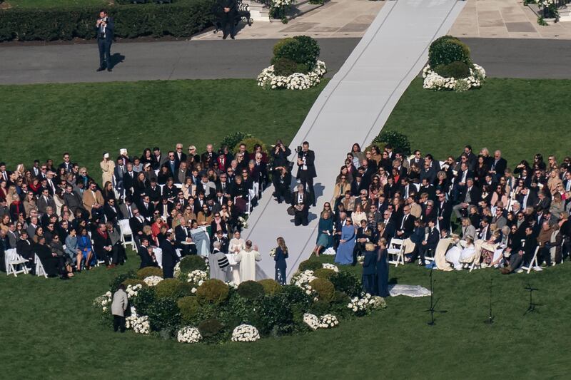 The nearly hour-long ceremony was attended by 250 family members and friends. AP