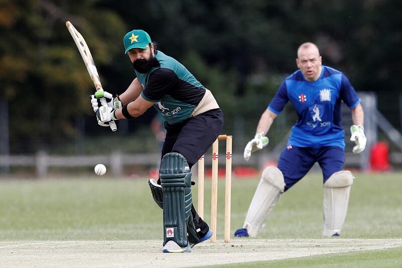 Abbas Jaffri lines up a pull shot during warm up match between England and Pakistani MPs at Teddington Cricket Club. All photos by Reuters