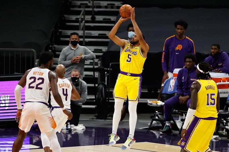Talen Horton-Tucker of the Los Angeles Lakers attempts a shot against the Phoenix Suns. AFP