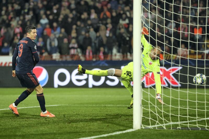 BELGRADE, SERBIA - NOVEMBER 26: Robert Lewandowski of FC Bayern Munich scores his team's third goal during the UEFA Champions League group B match between Crvena Zvezda and Bayern Muenchen at Rajko Mitic Stadium on November 26, 2019 in Belgrade, Serbia. (Photo by Lars Baron/Bongarts/Getty Images)