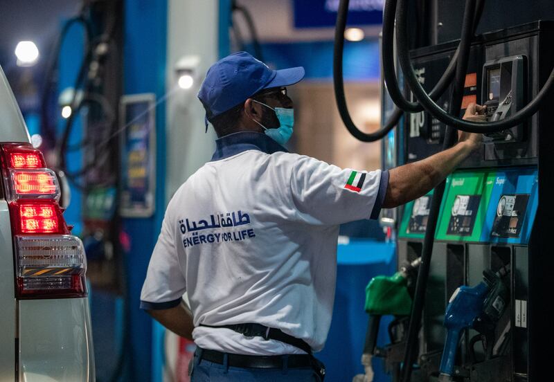 An Adnoc petrol station in Abu Dhabi. Motorists in the UAE will pay less for fuel in December. Victor Besa / The National