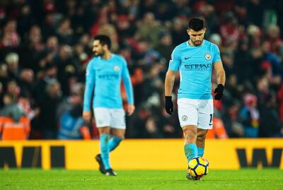 epa06438384 Manchester City's Sergio Aguero (R) reacts during the English Premier League soccer match between Liverpool FC and Mancheter City at Anfield in Liverpool, Britain, 14 January 2018.  EPA/PETER POWELL EDITORIAL USE ONLY. No use with unauthorized audio, video, data, fixture lists, club/league logos or 'live' services. Online in-match use limited to 75 images, no video emulation. No use in betting, games or single club/league/player publications