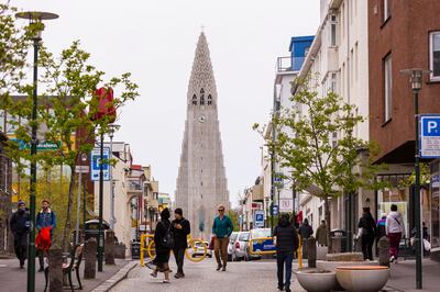 Icelandic capital Reykjavik. A large proportion of Iceland's workforce is now committed to shorter hours for the same pay. Alamy