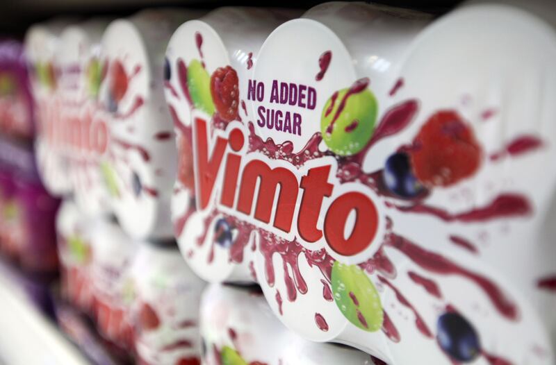 Cans of Vimto, produced by Nichols Plc, are seen on a supermarket shelf in London. Bloomberg
