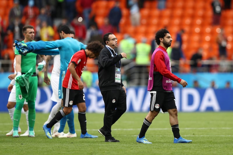 YEKATERINBURG, RUSSIA - JUNE 15:  Mohamed Salah of Egypt walks off the pitch dejected after the 2018 FIFA World Cup Russia group A match between Egypt and Uruguay at Ekaterinburg Arena on June 15, 2018 in Yekaterinburg, Russia.  (Photo by Ryan Pierse/Getty Images)