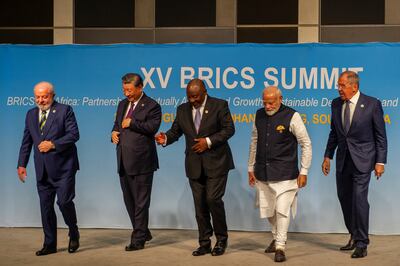 Brazil's President Luiz Inacio Lula da Silva, China's President Xi Jinping, South African President Cyril Ramaphosa, Indian Prime Minister Narendra Modi and Russia's Foreign Minister Sergei Lavrov at the Brics Summit in Johannesburg. Reuters