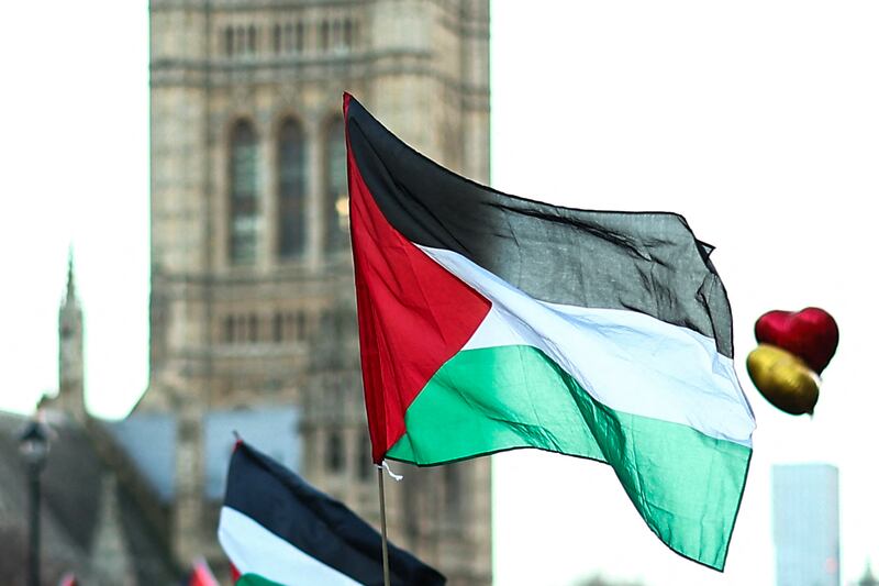 A Palestinian flag during a National March for Palestine in central London on December 9, 2023. AFP