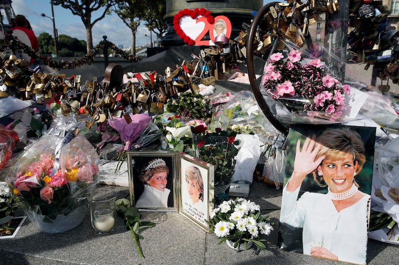 Photos, flowers and messages pay homage to Princess Diana on the 20th anniversary of her death in Paris. Getty