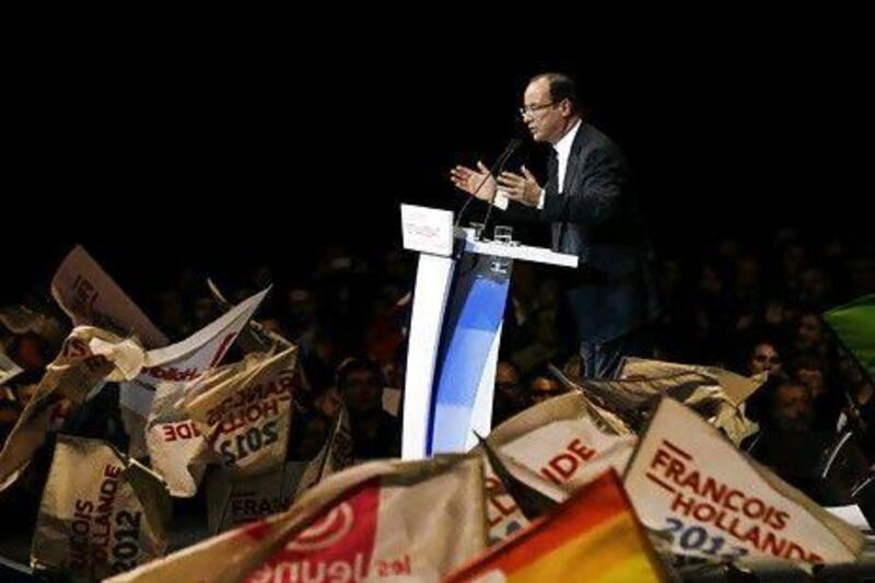 Francois Hollande says Nicolas Sarkozy is lying about Muslims being told to vote.