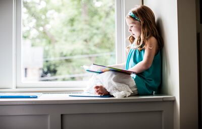 Creating a dedicated reading nook can help some children engage more with books. Getty Images