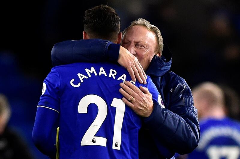 Soccer Football - Premier League - Cardiff City v Wolverhampton Wanderers - Cardiff City Stadium, Cardiff, Britain - November 30, 2018   Cardiff City manager Neil Warnock celebrates with Victor Camarasa at the end of the match    REUTERS/Rebecca Naden    EDITORIAL USE ONLY. No use with unauthorized audio, video, data, fixture lists, club/league logos or "live" services. Online in-match use limited to 75 images, no video emulation. No use in betting, games or single club/league/player publications.  Please contact your account representative for further details.