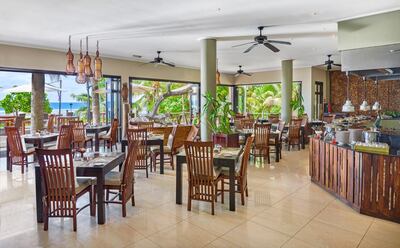 Les Palms Restaurant at DoubleTree by Hilton Seychelles Allamanda Resort & Spa.