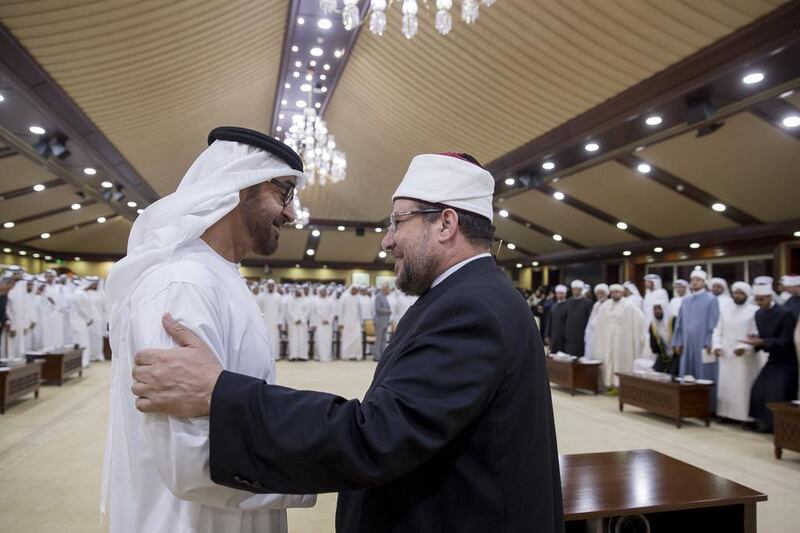 Sheikh Mohamed bin Zayed, Crown Prince of Abu Dhabi and Deputy Supreme Commander of the UAE Armed Forces, greets Dr Mohamed Mokhtar Gomaa, minister of religious endowments of Egypt, at a majlis. Mohamed Al Hammadi / Crown Prince Court - Abu Dhabi 

