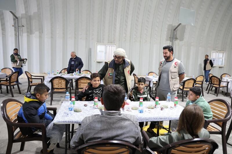 Members of the Emirates Red Crescent came together on Sunday to have iftar with Syrian refugees at Mrajeeb Al Fhood camp in Jordan. Wam