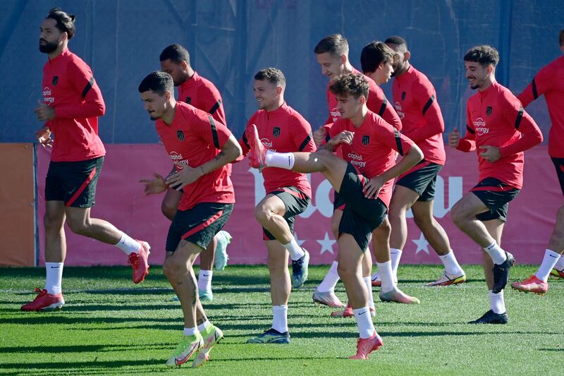 Atletico Madrid's Antoine Griezmann, cnetre, training with teammates. AFP