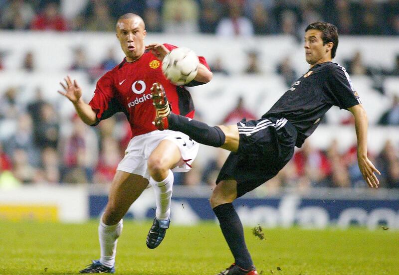 MANCHESTER, UNITED KINGDOM - APRIL 23:  Champions League 02/03, Manchester; Manchester United - Real Madrid 4:3; Mickael SILVESTRE/ManU, Santiago SOLARI/Madrid  (Photo by Andreas Rentz/Bongarts/Getty Images)