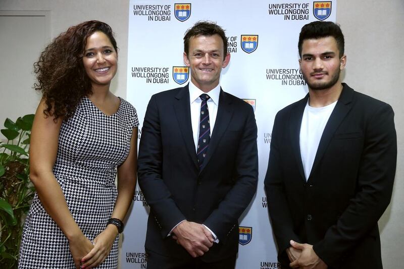 Adam Gilchrist, centre, on Sunday visited the University of Wollongong in Dubai to present the university’s third annual sports award named after him. This year’s recipients were swimmer Sarra Lajnef and cricketer Shivank Vijaykumar. Courtesy of Communicate Gulf